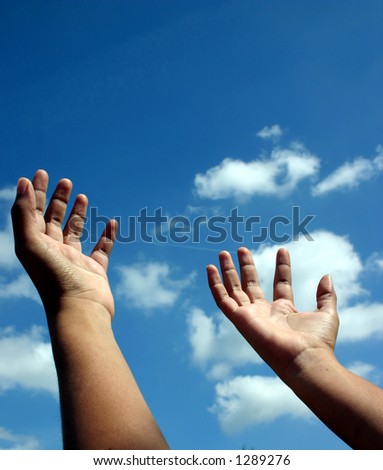 Hands raised unto the heavens as if in a gesture of spiritual supplication