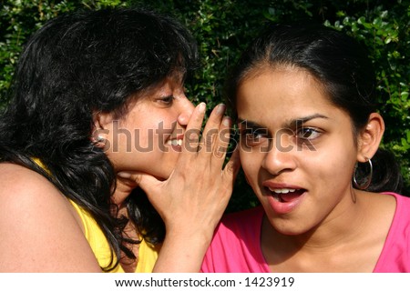 Image of two Indian females having a good chat, up to you to imagine what secrets may be being shared !