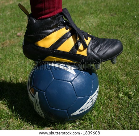football boot on football