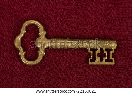 A golden decorative vintage key