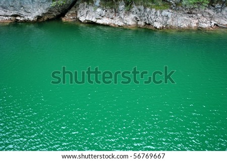 mountain lake of fresh water produced for the production of electricity