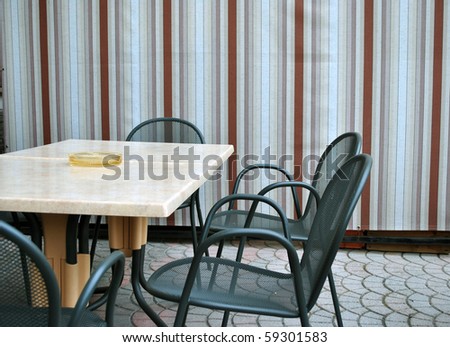table with empty chairs at the bar crisis in Europe
