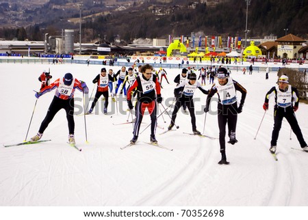 TESERO, ITALY -  JANUARY 29: Race Nordic Skiing for guests and VIP's at the cross-country ski stadium, classic style January 29, 2011 In Tesero, Trentino-South Tyrol - Italy