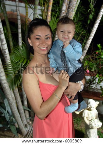Mother and baby son portrait with formal attire