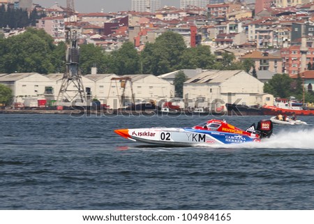 ISTANBUL, TURKEY - MAY 05: Saruhan TAN and Kerim ZORLU drive YKM Sport Team Offshore 225 boat during World Offshore 225 Championship, Halic stage on May 05, 2012 in Istanbul, Turkey