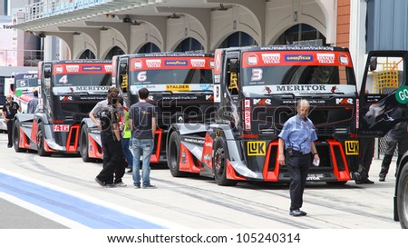 ISTANBUL, TURKEY - MAY 12: Adam Lacko and other drivers of Renault MKR Technology team at pit lane of 2012 FIA European Truck Racing Championship, Istanbul Park on May 12, 2012 in Istanbul, Turkey.