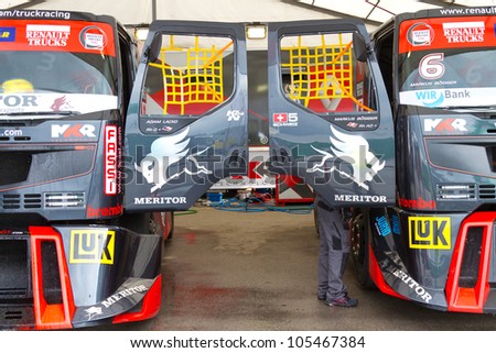 ISTANBUL, TURKEY - MAY 12: Adam Lacko and Markus Bosiger of Renault MKR Technology team at garage before 2nd Race of FIA European Truck Racing Championship on May 12, 2012 in Istanbul, Turkey.