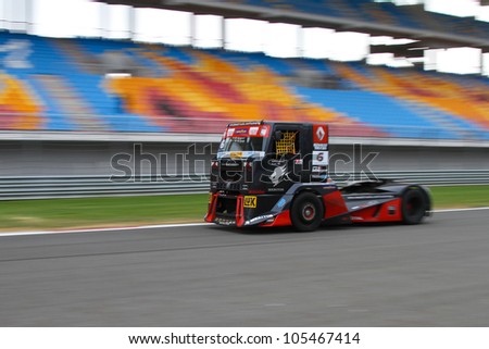 ISTANBUL - MAY 12: Markus Bosiger of Renault MKR Technology Team Hahn Racing team during 2nd race of 2012 FIA European Truck Racing Championship, Istanbul Park on May 12, 2012 in Istanbul, Turkey.