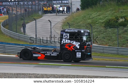 ISTANBUL - MAY 13: Mika Makinen of MAN Mad-Croc Truck Racing team during fourth race of 2012 FIA European Truck Racing Championship, Istanbul Park on May 13, 2012 in Istanbul, Turkey.
