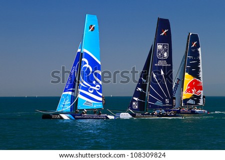 ISTANBUL - JUNE 09: Red Bull Sailing, Groupe Edmond De Rothschild and The Wave, Muscat team boats compete in the Extreme Sailing Series, on June 09, 2012 Istanbul, Turkey.