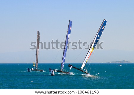 ISTANBUL - JUNE 09: ZouLou, Groupe Edmond De Rothschild and Red Bull Sailing team boats compete in the Extreme Sailing Series, on June 09, 2012 Istanbul, Turkey.