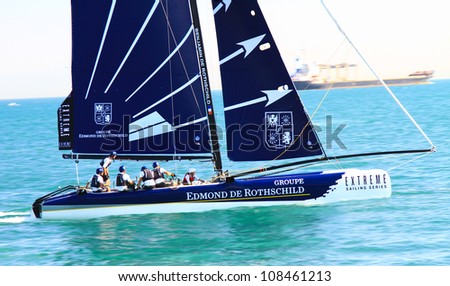ISTANBUL - JUNE 09: Skipper Pierre Pennec, Groupe Edmond De Rothschild team boat competes in the Extreme Sailing Series, on June 09, 2012 Istanbul, Turkey.