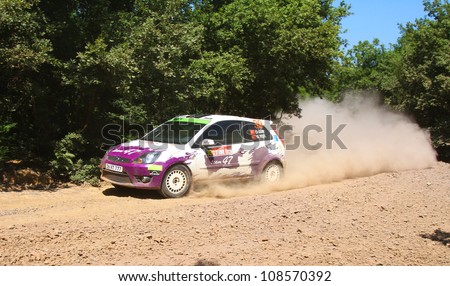 ISTANBUL - JUNE 10: Ozgur Gur drives a Team47 Motorsport Ford Fiesta St car during 33th Istanbul Rally championship, ISG Stage on June 10, 2012 in Istanbul, Turkey.