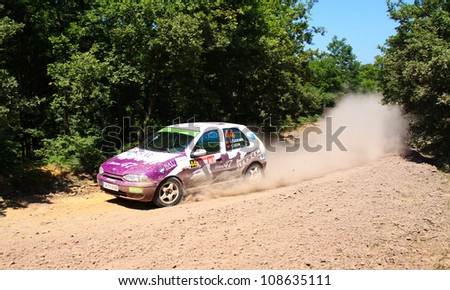 ISTANBUL - JUNE 10: Umit Can Ozdemir drives a Team47 Motorsport Fiat Palio car during 33th Istanbul Rally championship, ISG Stage on June 10, 2012 in Istanbul, Turkey.
