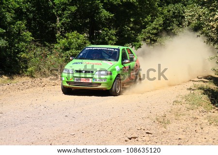 ISTANBUL - JUNE 10: Ender Kozlu drives a Gen Power Rally Team Fiat Palio car during 33th Istanbul Rally championship, ISG Stage on June 10, 2012 in Istanbul, Turkey.