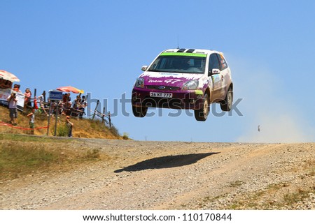 ISTANBUL - JULY 07: Ozgur Gur drives a Team 47 Motorsports team Ford Fiesta St car during 41st Bosphorus Rally ERC Championship, Halli Stage on July 7, 2012 in Istanbul, Turkey.