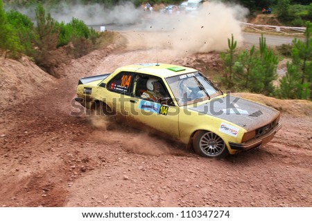 ISTANBUL - JULY 08: Refik Can Eroskay drives an Opel Ascona car during 41st Bosphorus Rally ERC Championship, Halli Stage on July 8, 2012 in Istanbul, Turkey.