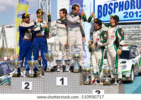 ISTANBUL - JULY 08: Juho Hanninen(1st), Yagiz Avci(2nd), Luca Rossetti(3rd) at podium of 41st Bosphorus Rally ERC Championship on July 8, 2012 in Istanbul, Turkey.