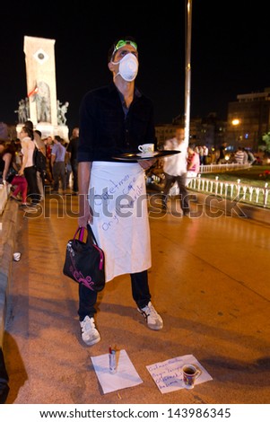 ISTANBUL - JUNE 25: Man makes silent protest in protests police who shot and killed protestor Ethem Sarisuluk during protests in Turkey on June 25, 2013 in Istanbul, Turkey.