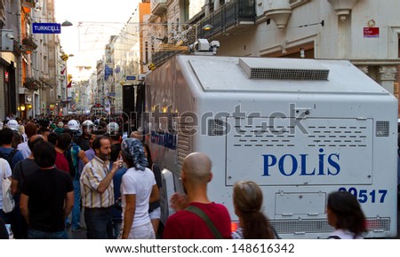 ISTANBUL - AUGUST 03: Riot Control Vehicle in Istiklal Street on August 03, 2013 in Istanbul, Turkey. Police intervene unorganized small groups of anti-government protestors.