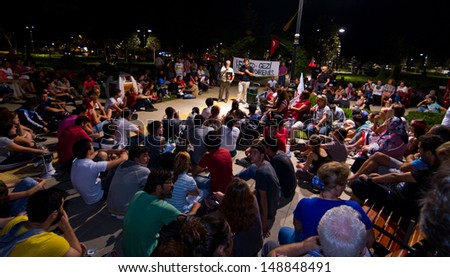 ISTANBUL - AUGUST 05: People share their ideas in Goztepe Park Forum in protests to sentencing in Ergenekon conspiracy on August 05, 2013 in Istanbul, Turkey.