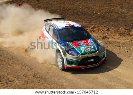Istanbul - September 29: Orhan Avcioglu Drives Ford Fiesta S2000 Of Castrol Ford Team Turkey In 42nd Bosphorus Rally Mudarli Stage On September 29, 2013 In Istanbul, Turkey.