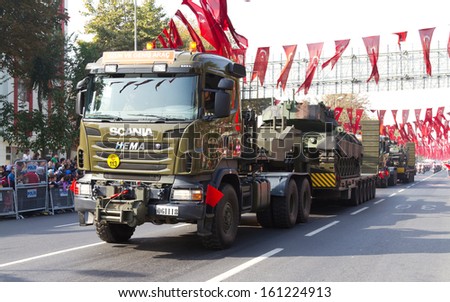 ISTANBUL - OCTOBER 29: Tracked vehicle carrier at Vatan Avenue during Republic Day celebration of Turkey on October 29, 2013 in Istanbul, Turkey.