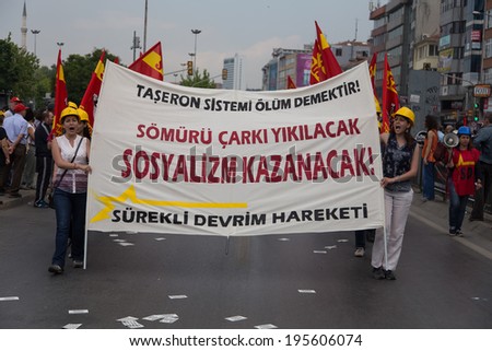 ISTANBUL, TURKEY - MAY 25, 2014: Unions march in protest against subcontractors in Turkey. Socialism will win write on banner