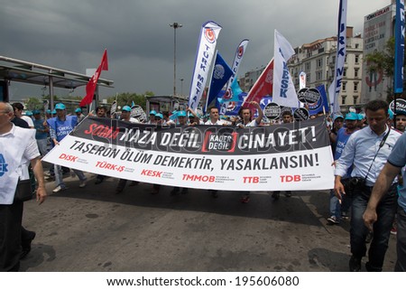 ISTANBUL, TURKEY - MAY 25, 2014: Unions march in protest against subcontractors in Turkey. Soma is murder not an accident write on banner