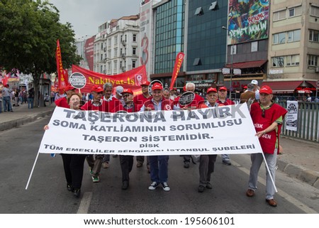 ISTANBUL, TURKEY - MAY 25, 2014: Unions march in protest against subcontractors in Turkey. No to subcontracting write on banner