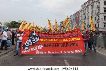 ISTANBUL, TURKEY - MAY 25, 2014: Unions march in protest against subcontractors in Turkey. Subcontractors killing write on banner