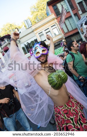 ISTANBUL, TURKEY - JUNE 29, 2014: Man in 22. LGBTI Pride March held in Istiklal Avenue, Istanbul. Tens of thousands of people gathered to celebrate LGBT Honor week.