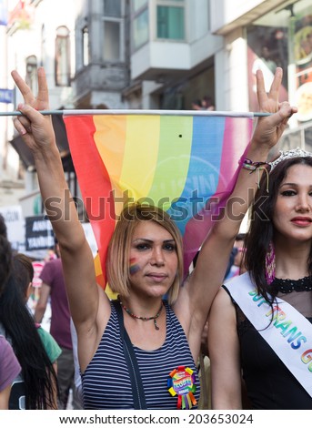 ISTANBUL, TURKEY - JUNE 29, 2014: Woman in 22. LGBTI Pride March held in Istiklal Avenue, Istanbul. Tens of thousands of people gathered to celebrate LGBT Honor week.