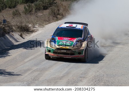 ISTANBUL, TURKEY - JULY 13, 2014: Orhan Avcioglu drives Ford Fiesta S2000 of Castrol Ford Team Turkey in 35. Istanbul Rally, Ulupelit ITO Stage