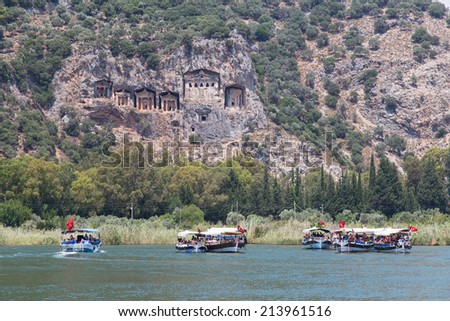DALYAN, MUGLA, TURKEY - JULY 19, 2014: Tour boat in Dalyan river. River tour between Koycegiz lake and Iztuzu beach is one of the most populer activity in Dalyan.