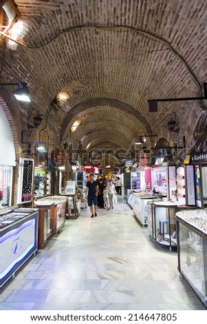 IZMIR, TURKEY - JULY 21, 2014: People shopping in old Kizlaragasi Bazaar that was built in 1744 and is one of the most popular traditional Bazaar in Izmir.