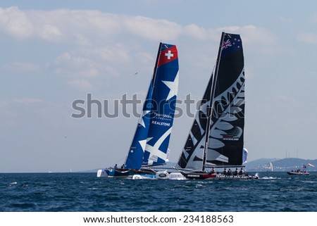 ISTANBUL, TURKEY - SEPTEMBER 13, 2014: Emirates Team New Zealand and Realteam competes in Extreme Sailing Series.