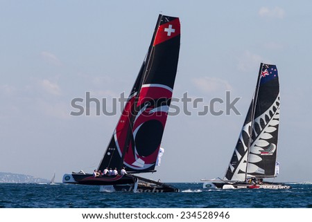 ISTANBUL, TURKEY - SEPTEMBER 13, 2014: Emirates Team New Zealand and Alinghi Teams competes in Extreme Sailing Series.