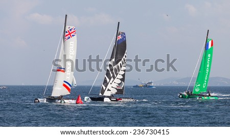 ISTANBUL, TURKEY - SEPTEMBER 14, 2014: Emirates Team New Zealand, J.P. Morgan BAR and Groupama teams compete in Extreme Sailing Series.
