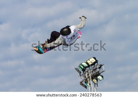 ISTANBUL, TURKEY - DECEMBER 20, 2014: Antoine Truchon jump in FIS Snowboard World Cup Big Air. This is first Big Air event for both, men and women.