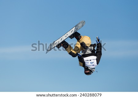 ISTANBUL, TURKEY - DECEMBER 20, 2014: Niklas Mattsson jump in FIS Snowboard World Cup Big Air. This is first Big Air event for both, men and women.