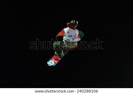 ISTANBUL, TURKEY - DECEMBER 20, 2014: Ryan Stassel jump in FIS Snowboard World Cup Big Air. This is first Big Air event for both, men and women.