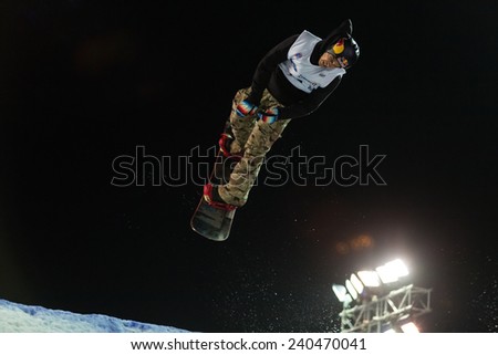 ISTANBUL, TURKEY - DECEMBER 20, 2014: Seppe Smits jump in FIS Snowboard World Cup Big Air. This is first Big Air event for both, men and women.