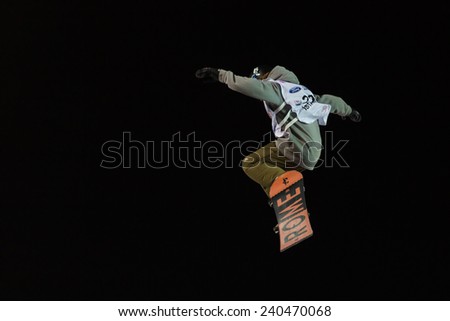 ISTANBUL, TURKEY - DECEMBER 20, 2014: Eric Willett jump in FIS Snowboard World Cup Big Air. This is first Big Air event for both, men and women.