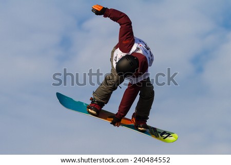 ISTANBUL, TURKEY - DECEMBER 20, 2014: Elena Koenz jump in FIS Snowboard World Cup Big Air. This is first Big Air event for both, men and women.