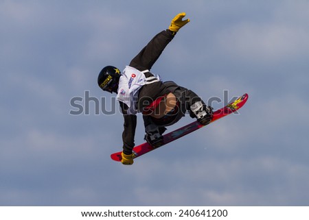 ISTANBUL, TURKEY - DECEMBER 20, 2014: Brandon Davis jump in FIS Snowboard World Cup Big Air. This is first Big Air event for both, men and women.