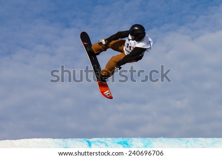 ISTANBUL, TURKEY - DECEMBER 20, 2014: Petja Piiroinen jump in FIS Snowboard World Cup Big Air. This is first Big Air event for both, men and women.