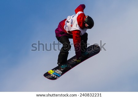 ISTANBUL, TURKEY - DECEMBER 20, 2014: Sina Candrian jump in FIS Snowboard World Cup Big Air. This is first Big Air event for both, men and women.