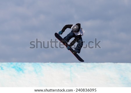 ISTANBUL, TURKEY - DECEMBER 20, 2014: Ville Paumola jump in FIS Snowboard World Cup Big Air. This is first Big Air event for both, men and women.