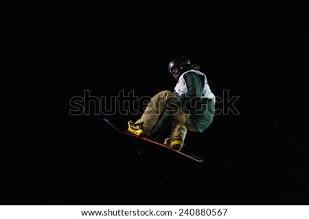 ISTANBUL, TURKEY - DECEMBER 20, 2014: Janne Korpi jump in FIS Snowboard World Cup Big Air. This is first Big Air event for both, men and women.
